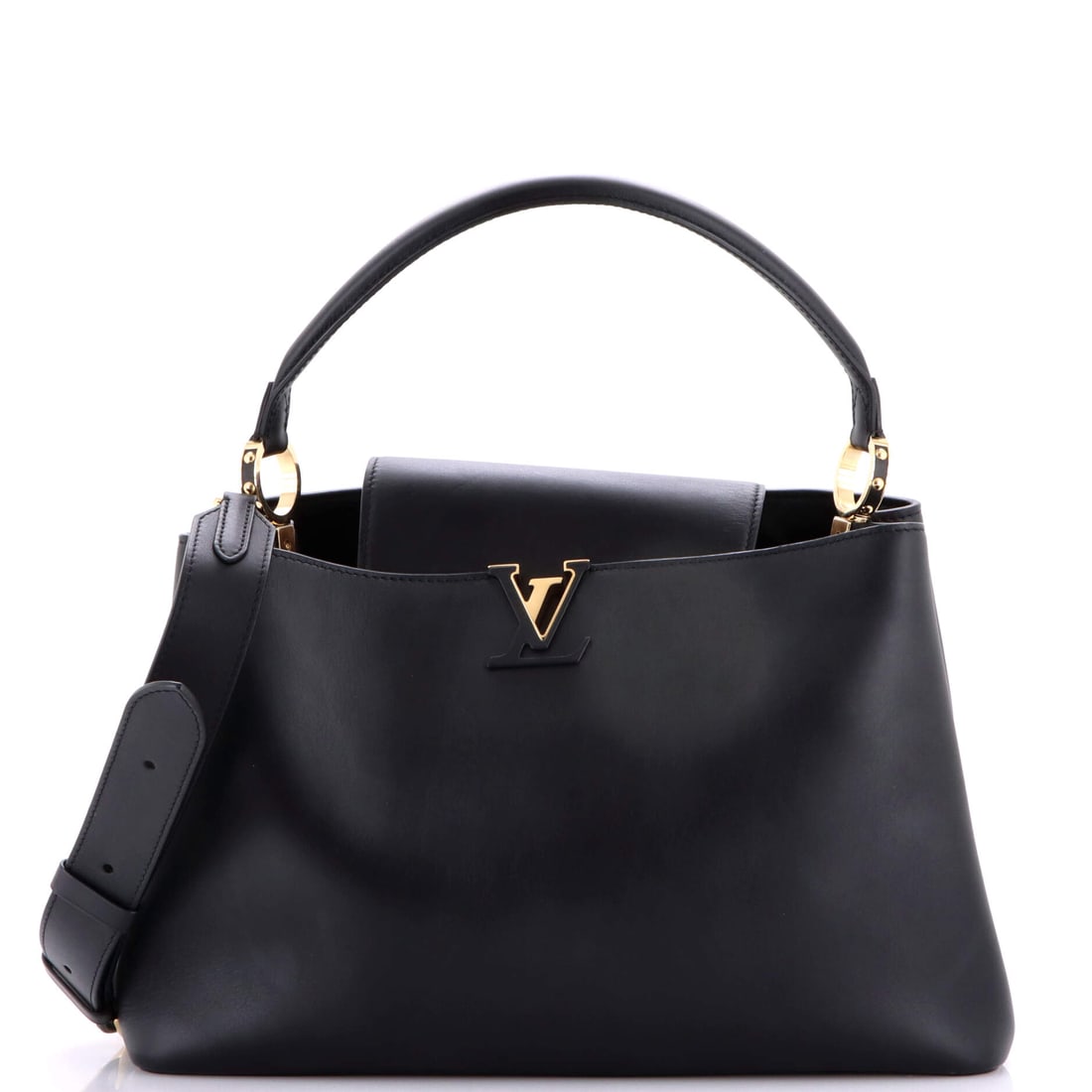 Louis Vuitton Capucines Souple Bag Leather: Louis Vuitton's Capucines arrives in the architecture that made the line known: the proportion the line has kept across reissues. Its 9 by 14 by 6 inch footprint gives it a confident day-into-evening 
