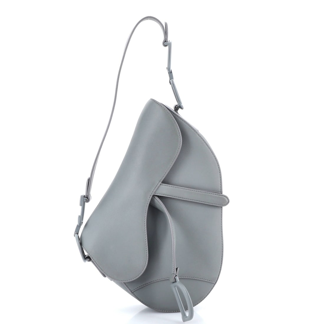 Christian Dior Ultra Matte Saddle Handbag Leather: This is the Saddle as the line is meant to read - the asymmetric, stirrup-clasp silhouette John Galliano drew up for Dior in 1999, in the proportions Christian Dior has held since debut. Sized with a 