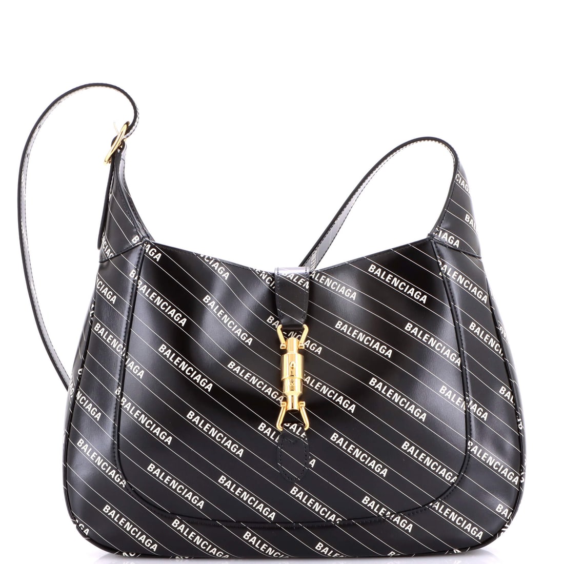 Gucci x Balenciaga The Hacker Project Jackie 1961 Hobo Printed Leather: Carried right, the Jackie reads as the house's working signature: the hobo silhouette with the piston-clasp closure that Jackie Onassis carried often enough to be renamed in her honour. The 10 by 13.5