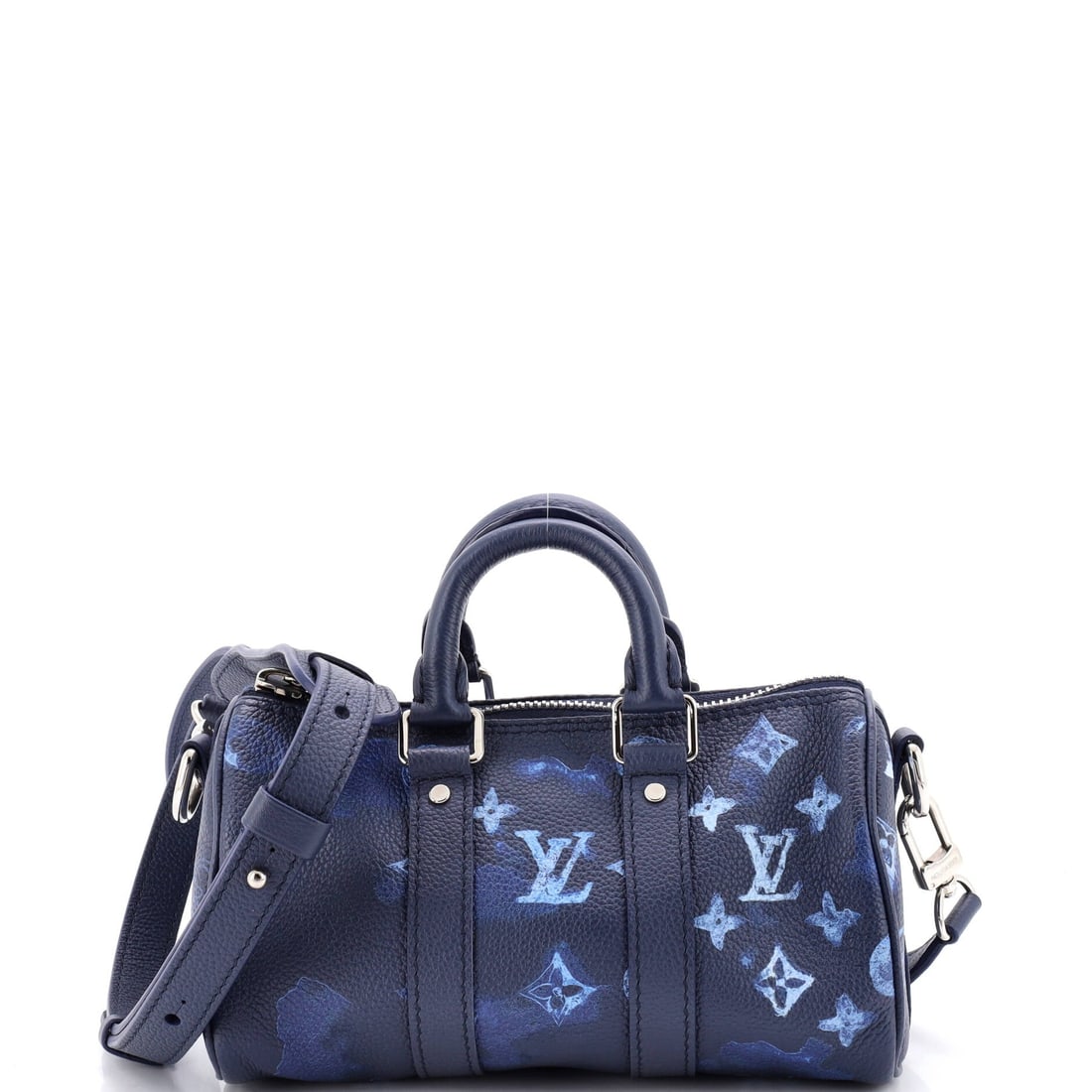 Louis Vuitton Keepall Bandouliere Bag Limited Edition Monogram Ink Watercolor Leather: This is the Keepall as the line is meant to read - the soft-sided weekender shape Marc Newson's predecessors at Vuitton standardised in the 1930s as the original carry-on, in the proportions Louis