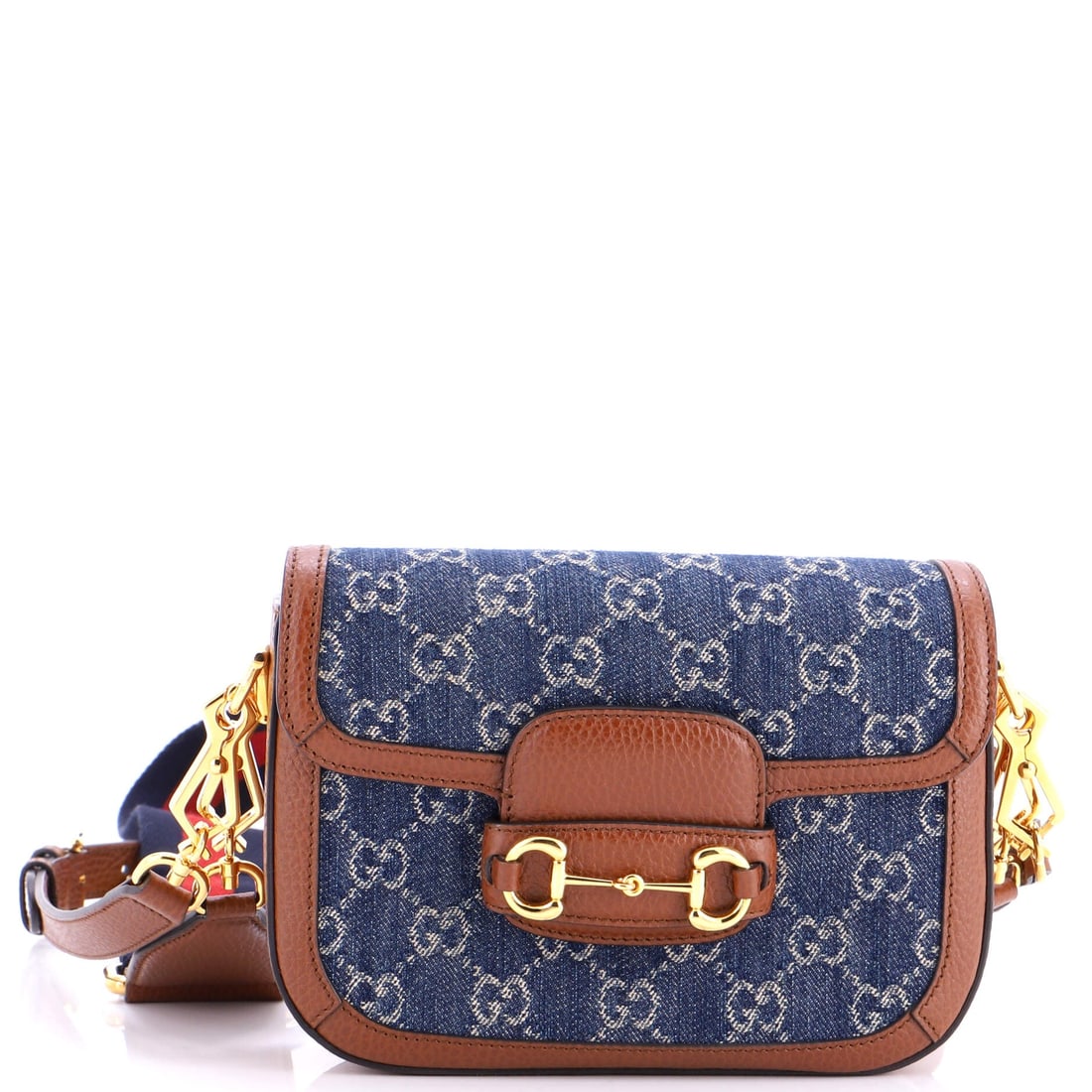 Gucci Horsebit 1955 Shoulder Bag GG Denim: Picked up once, the Horsebit explains why the line has been kept in production this long: the working silhouette the line is named for. At 6 by 8 by 2 inch, the silhouette reads as compact without eve
