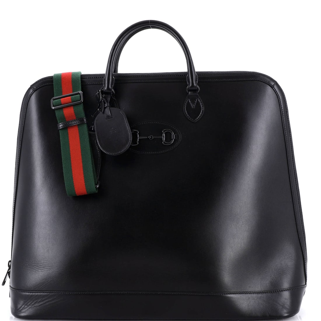 Gucci Horsebit 1955 Web Duffle Bag Leather: Set against its lineage, this Gucci Horsebit reads as a measured example of the line, built around the working silhouette the line is named for. At 17.5 by 19 by 6.5 inch, the silhouette reads as gene