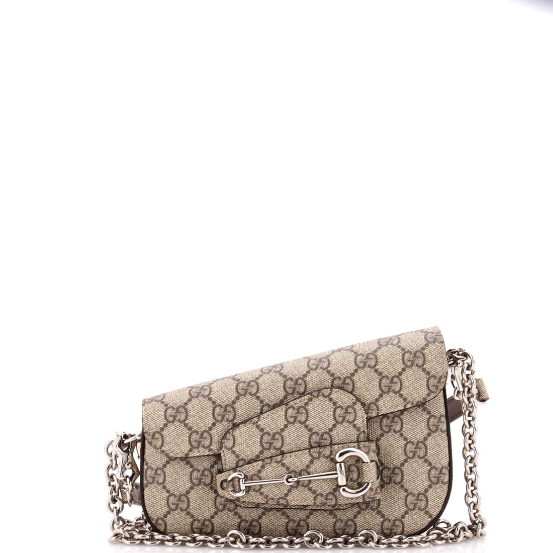 Gucci Horsebit 1955 Asymmetric Shoulder Bag GG Coated Canvas: Stand the Horsebit on a flat surface and the design logic shows itself - the proportion the line has kept across reissues. Worked in GG canvas - the coated cotton jacquard Gucci has carried since the 