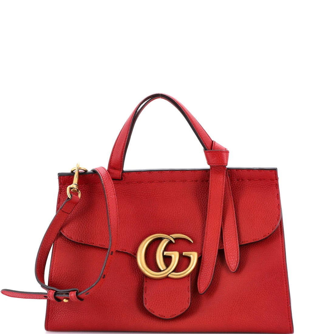Gucci GG Marmont Top Handle Bag Leather: Look closely at the Marmont and the architecture explains itself - the quilted-leather flap silhouette finished with the antique-finish double-G clasp that names it. The 9 by 12.5 by 5 inch format rea
