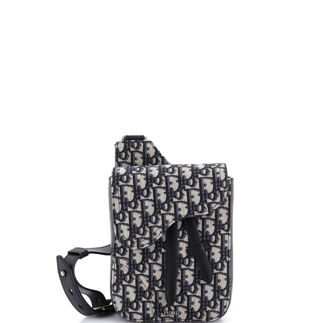 Christian Dior Saddle Rectangular Crossbody Pouch Oblique Canvas: Stand the Saddle on a flat surface and the design logic shows itself - the asymmetric, stirrup-clasp silhouette John Galliano drew up for Dior in 1999. It is rendered in Oblique - Dior's diagonal-mono