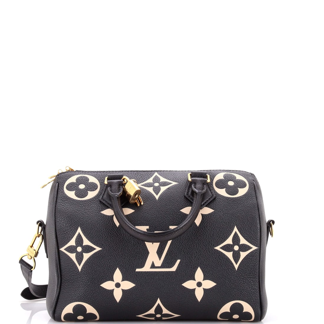 Louis Vuitton Speedy Bandouliere Bag Bicolor Monogram Empreinte Giant: Properly seen, this Speedy carries the architecture the line has always relied on: the rolled top handles, the curved silhouette and the front-and-back symmetry that have made it the most copied bag i
