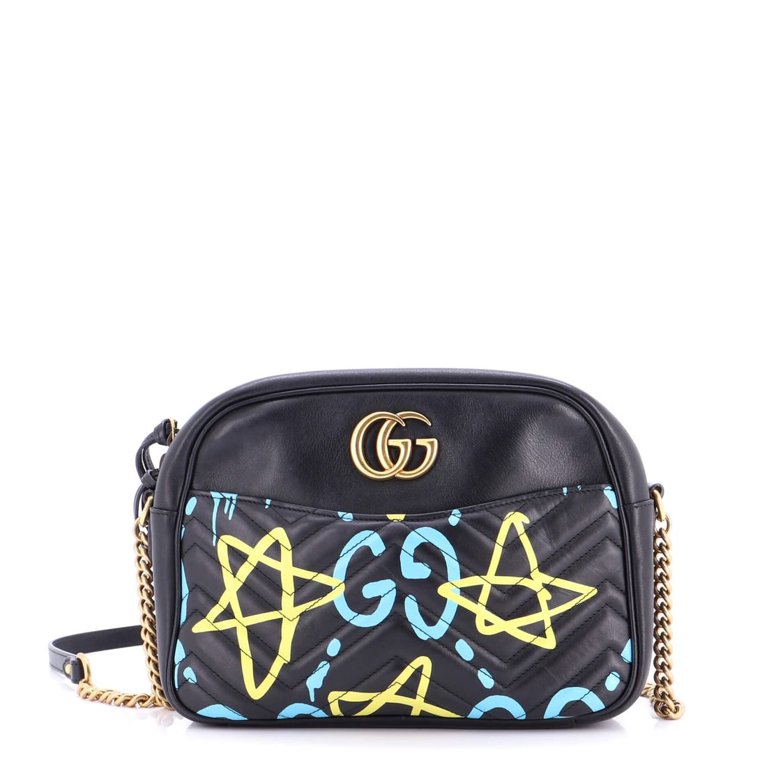 Gucci GG Marmont Shoulder Bag GucciGhost Matelasse Leather: Look closely at the Marmont and the architecture explains itself - the quilted-leather flap silhouette finished with the antique-finish double-G clasp that names it. The piece is finished in matelasse