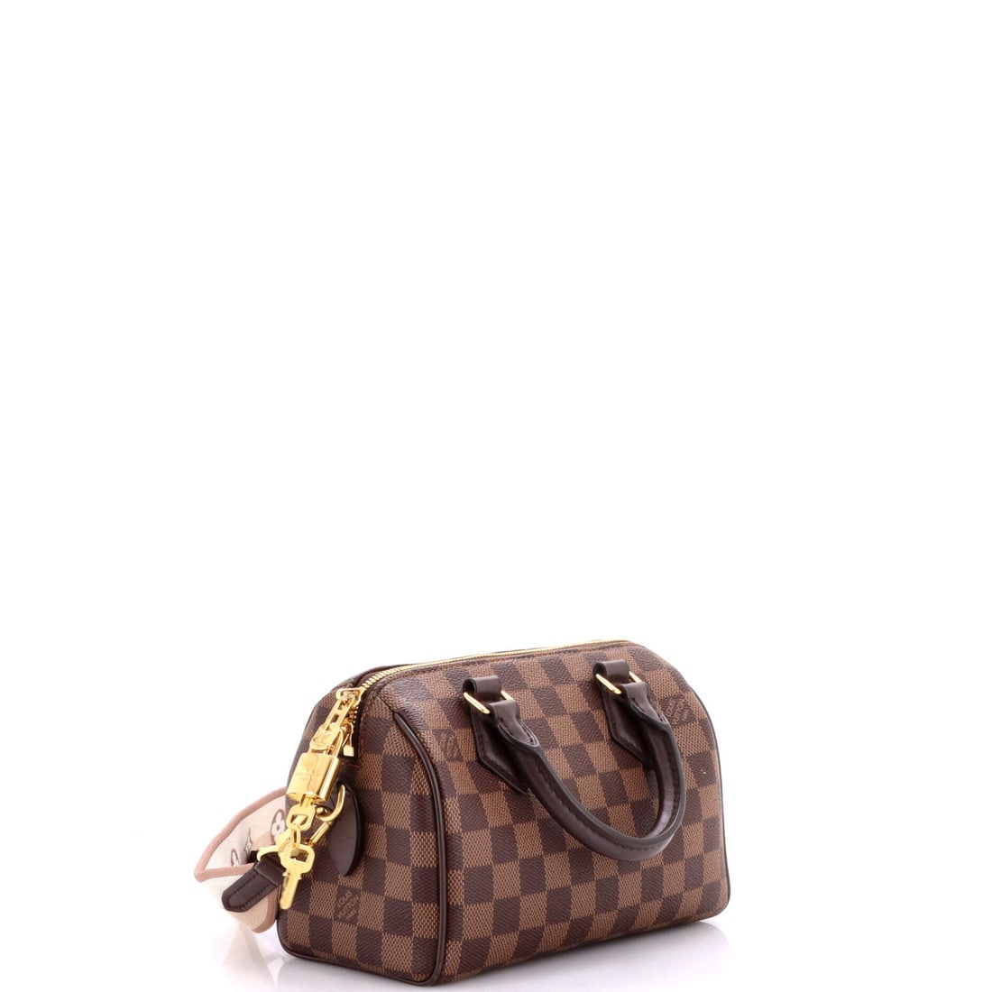Louis Vuitton Speedy Bandouliere Bag Damier: Properly seen, this Speedy carries the architecture the line has always relied on: the rolled top handles, the curved silhouette and the front-and-back symmetry that have made it the most copied bag i