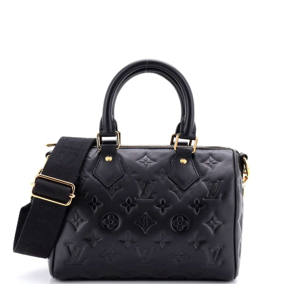 Louis Vuitton Speedy Bandouliere Bag Monogram Embossed Lambskin: Carried right, the Speedy reads as the house's working signature: the rolled top handles, the curved silhouette and the front-and-back symmetry that have made it the most copied bag in handbag history