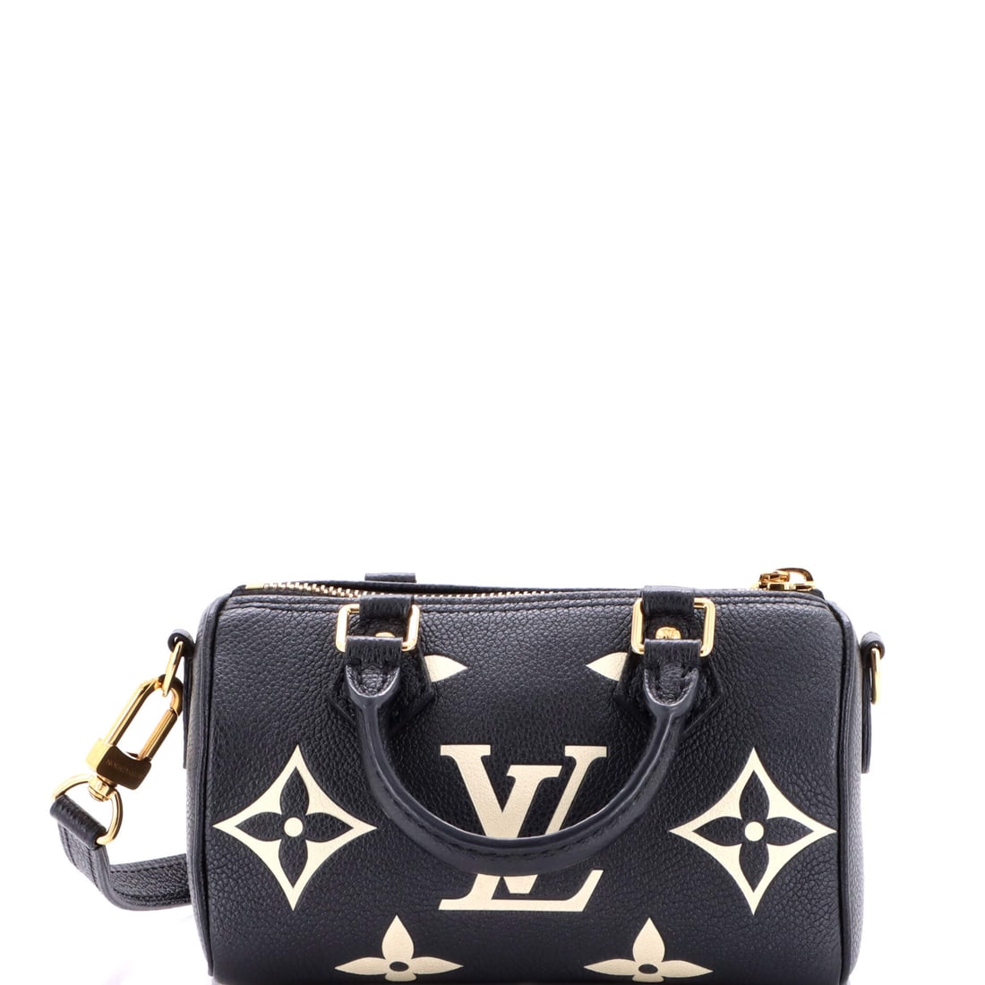 Louis Vuitton Speedy Bandouliere NM Bag Bicolor Monogram Empreinte Giant: Examined closely, the Speedy resolves around a single design idea: the rolled top handles, the curved silhouette and the front-and-back symmetry that have made it the most copied bag in handbag histor