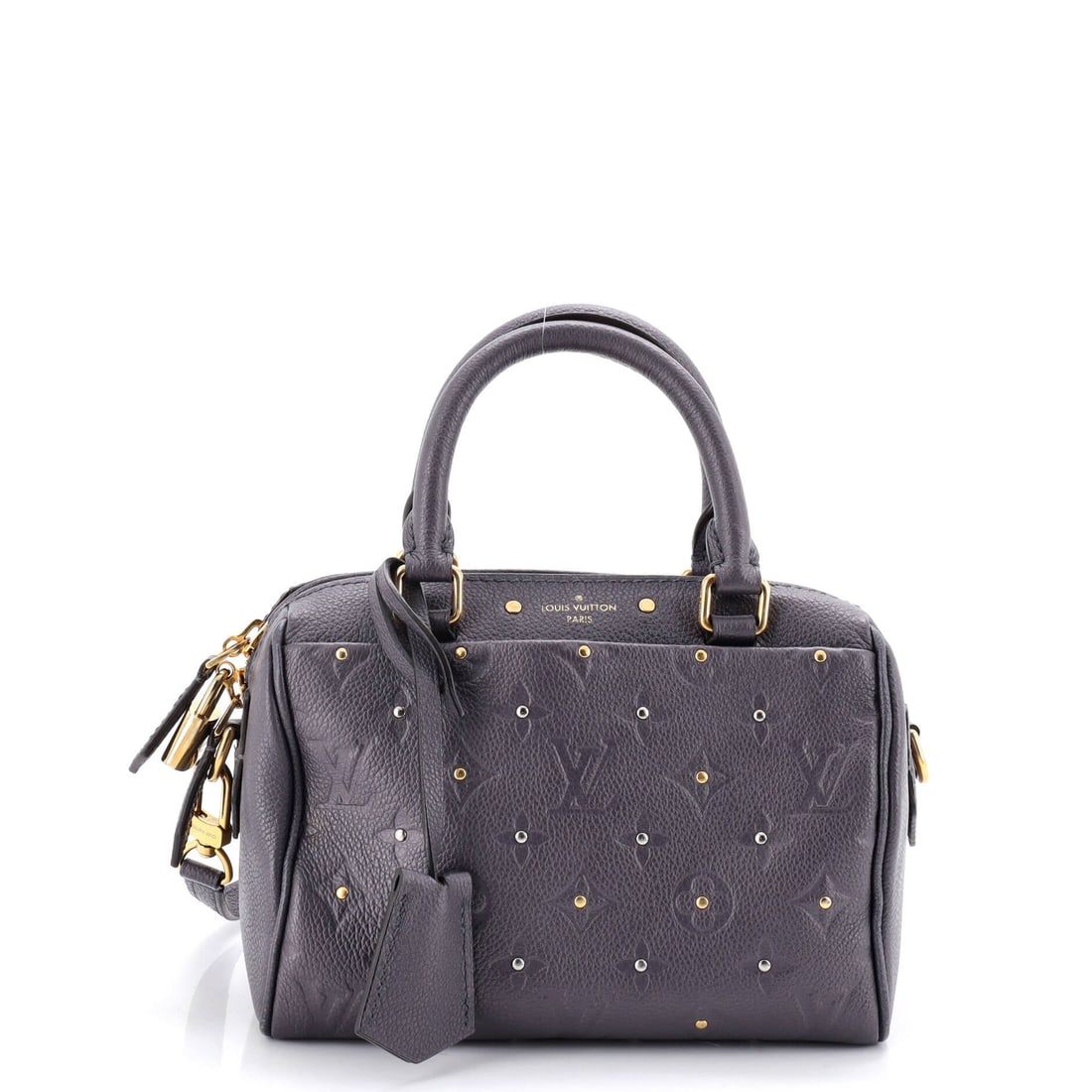 Louis Vuitton Speedy Bandouliere NM Bag Studded Monogram Empreinte Leather: Few silhouettes are as immediately legible as the Speedy, and this Louis Vuitton example carries it well - the rolled top handles, the curved silhouette and the front-and-back symmetry that have made 