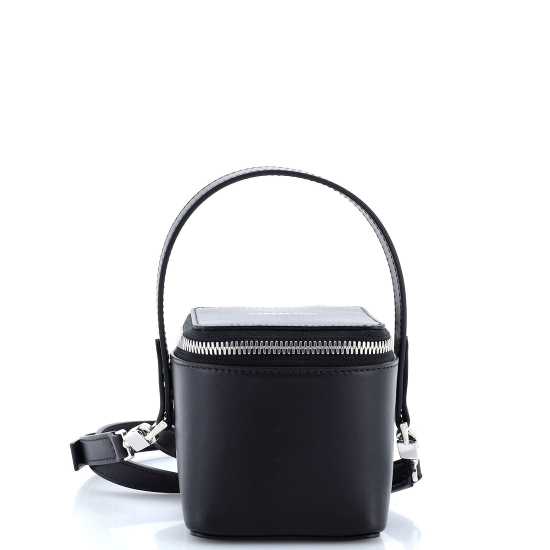 Salvatore Ferragamo Gancicni Top Handle Vanity Case Leather Micro: Salvatore Ferragamo's Gancicni Top Handle Vanity Case is a study in measured architecture, the kind of carry that telegraphs taste before it ever signals brand. Worked in Leather, the surface carries