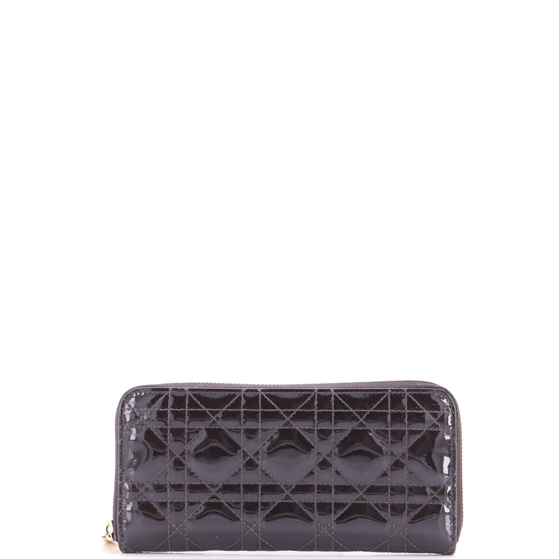 Christian Dior Lady Dior Zip Around Wallet Cannage Quilt Patent Long: Presented here, the Christian Dior Lady Dior Zip Around Wallet brings the maison's full leather-goods language down to a hand-held proportion. The leatherwork is in the cannage, Dior's signature diamo