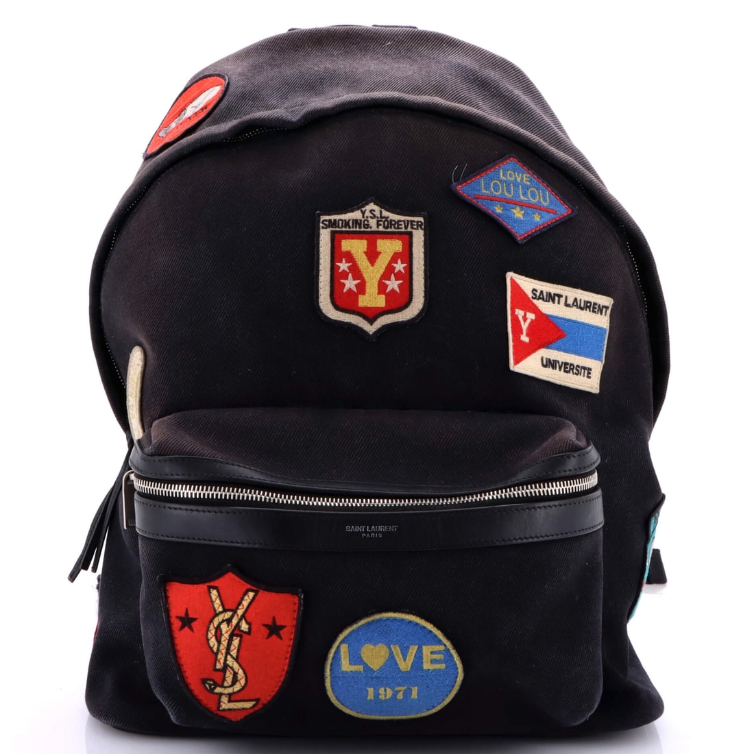 Saint Laurent City Backpack Patch Embellished Canvas Medium: The Saint Laurent City Backpack carries a stance the maison has refined across many iterations into something instantly recognizable. Cut in Patch Embellished Canvas, it has the considered hand a care