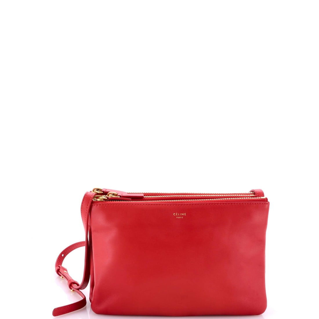 Celine Trio Crossbody Bag Leather Small: Celine built the Trio Crossbody Bag as a piece that holds its own in a wardrobe rather than competing with it. It is constructed in Leather, with the kind of considered finish the house is known for.