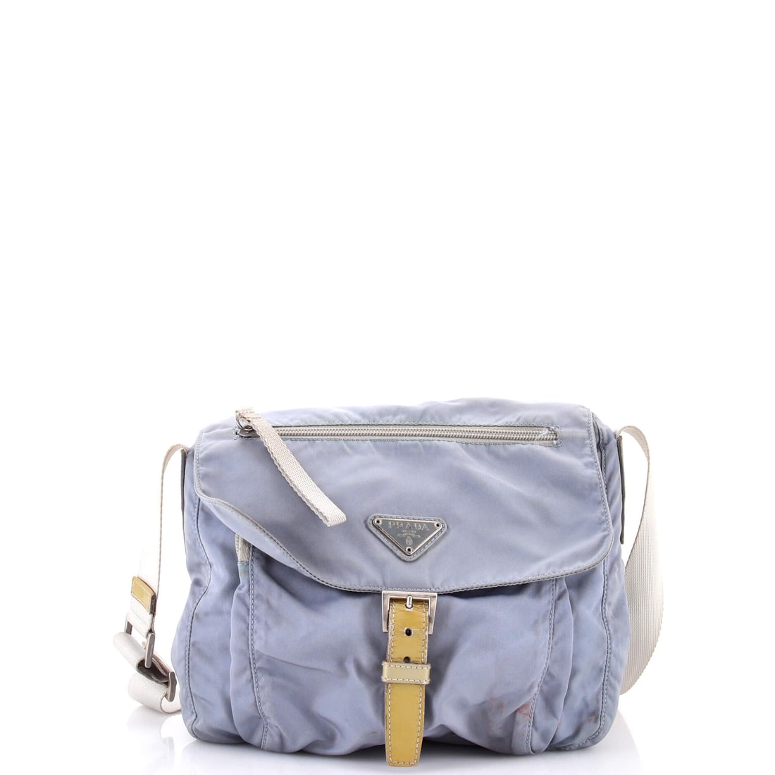 Prada Buckle Messenger Bag Tessuto Small: The Prada Buckle Messenger Bag carries a stance the maison has refined across many iterations into something instantly recognizable. It carries the unmistakable hand of tessuto, Prada's signature