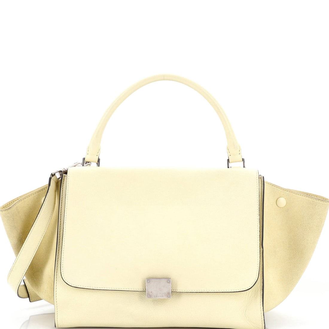 Celine Trapeze Bag Leather Medium: Celine's Trapeze Bag sits squarely in the maison's most-quoted handbag language, with a profile that has earned its place in serious wardrobes. The make is in Leather, a choice that gives the piece