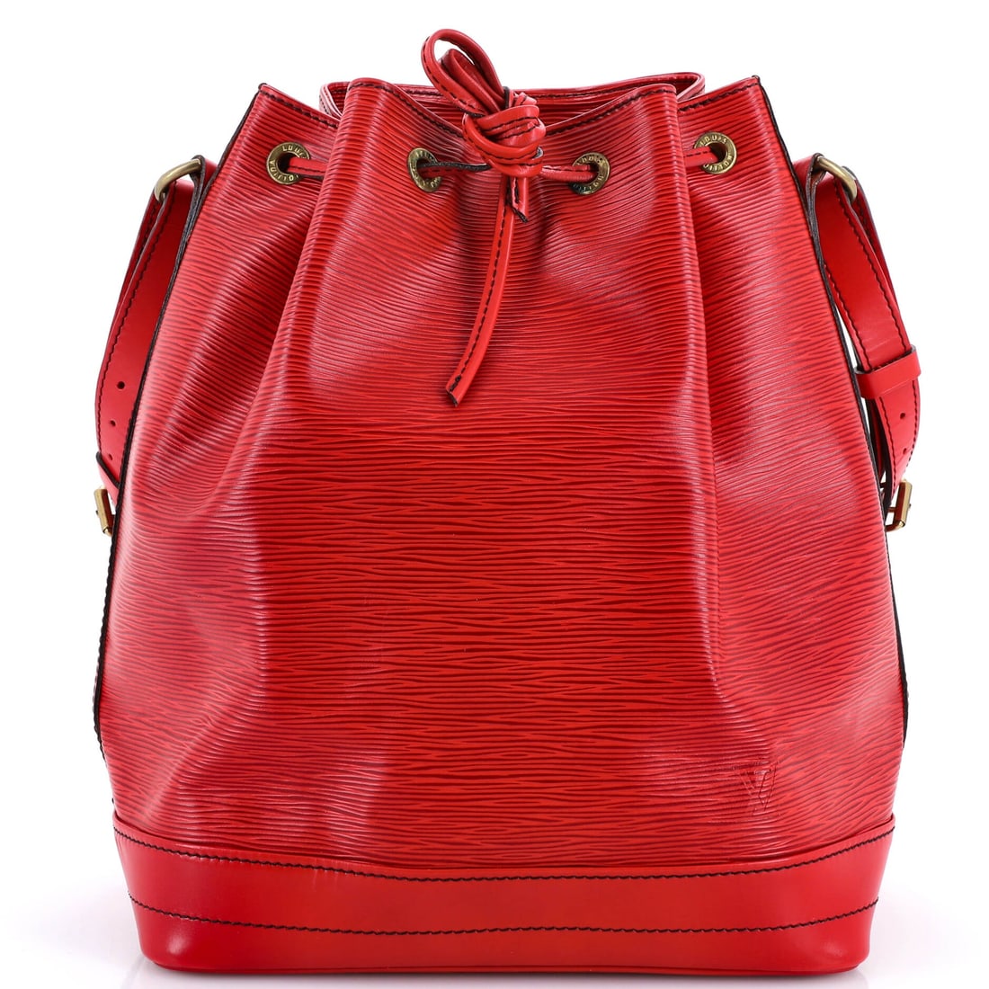 Louis Vuitton Noe Handbag Epi Leather Large: The Noe Handbag from Louis Vuitton reads as a thoughtful piece of bag-making, with construction that prioritizes posture and proportion over noise. The build is in Epi leather, Vuitton's textured grai