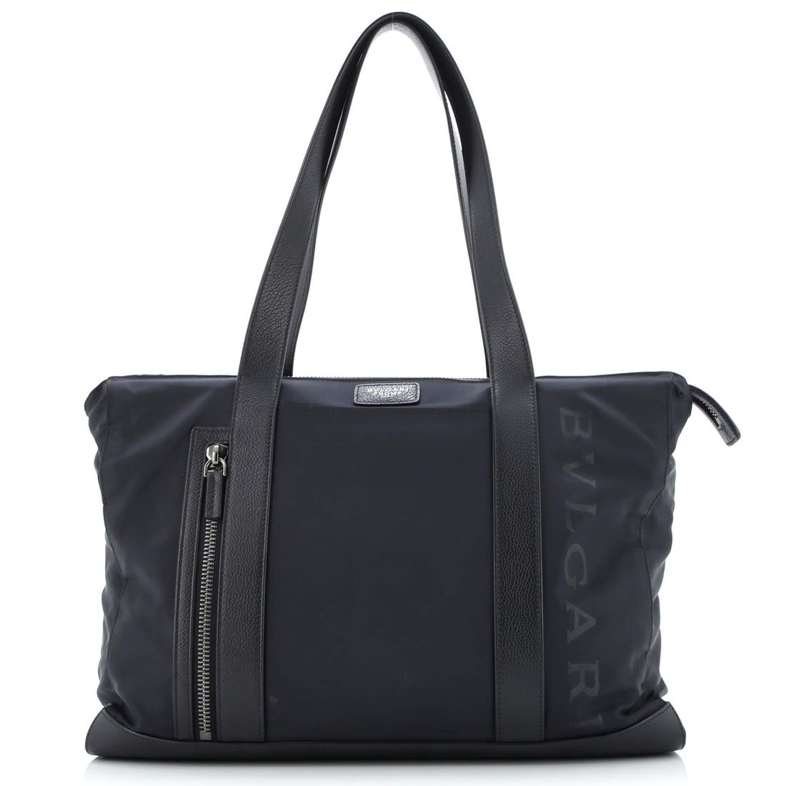 Bvlgari Fragment Zip Tote Nylon with Leather Medium: Bvlgari's Fragment Zip Tote reads first as architecture and only second as accessory, which is the highest compliment for a house bag. Cut in Nylon with Leather, it has the considered hand a careful