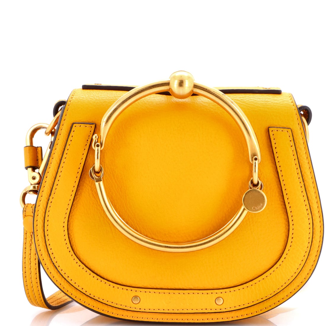 Chloe Nile Crossbody Bag Leather Small: This Chloe Nile Crossbody Bag arrives through Maison de Beaubigonne's trade channel with the silhouette the house treats as a fixture in its core lineup. The make is in Leather, a choice that gives th