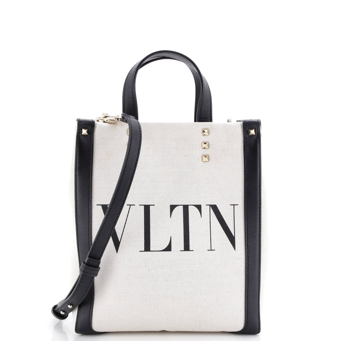 Valentino Garavani Grande Plage VLTN Tote Canvas Mini: Presented here, the Valentino Garavani Grande Plage VLTN Tote arrives with the proportions and stance that the house refined into a recognizable signature. The make is in Canvas, a choice that gives t