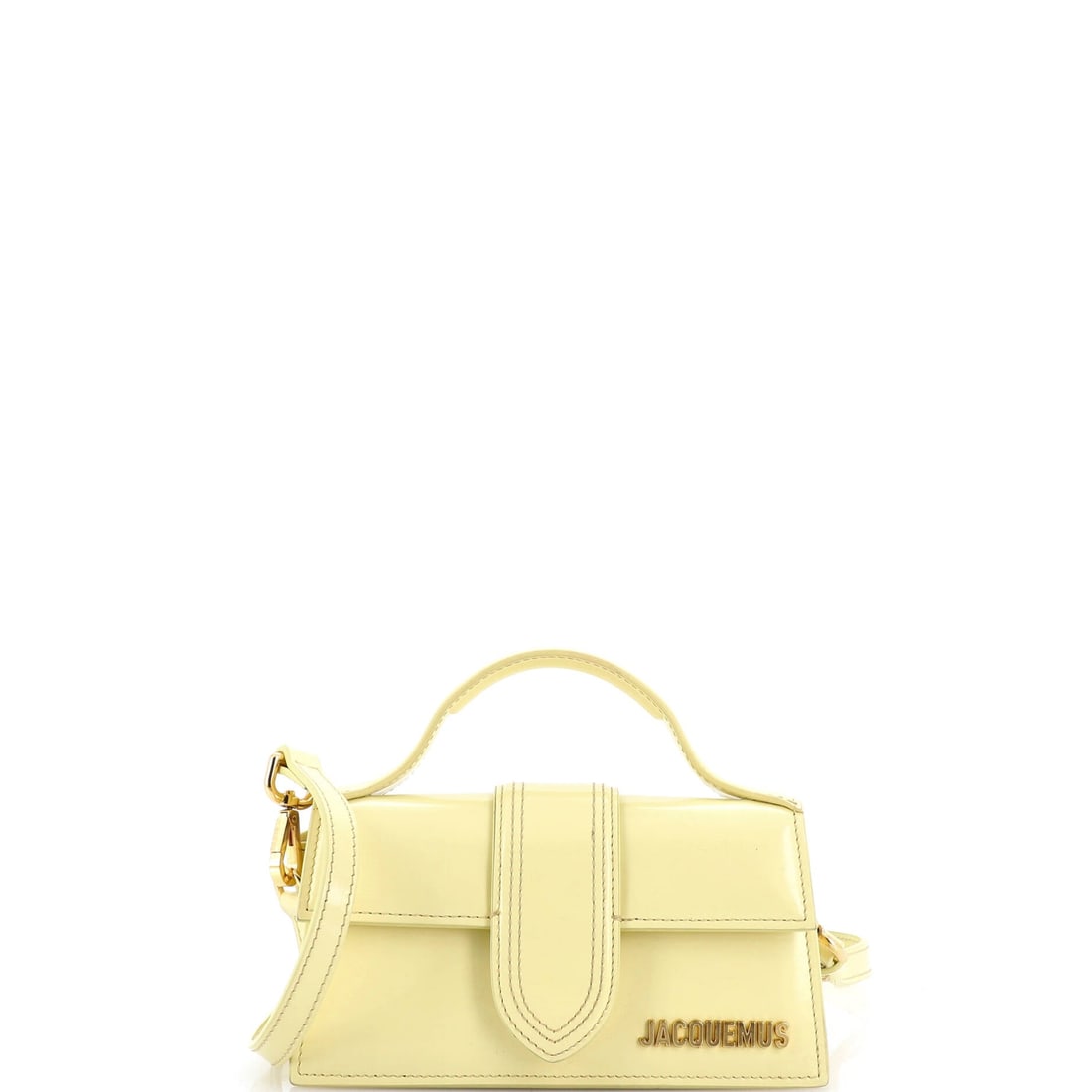 Jacquemus Le Bambino Top Handle Flap Bag Leather: Jacquemus's Le Bambino Top Handle Flap Bag sits squarely in the maison's most-quoted handbag language, with a profile that has earned its place in serious wardrobes. The make is in Leather, a choice t