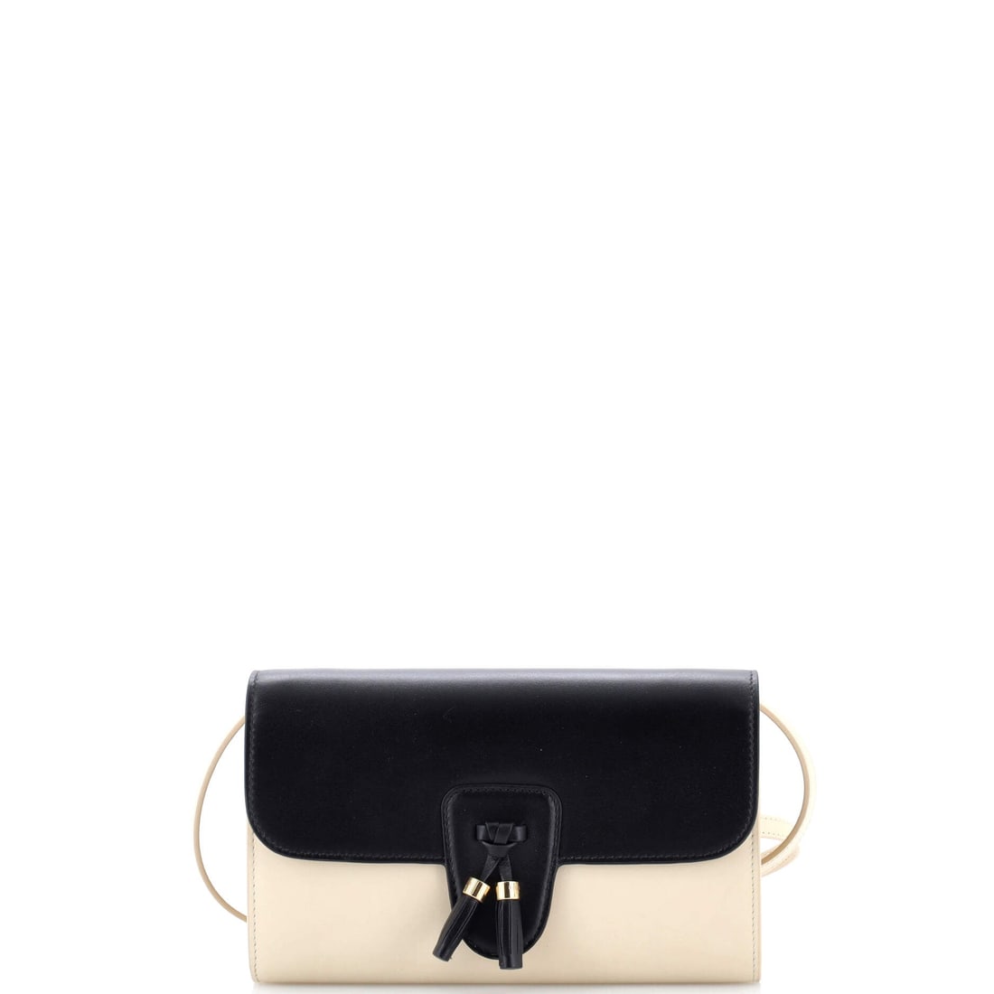 Celine Tassels Wallet on Strap Leather: Celine's Tassels Wallet on Strap reads first as architecture and only second as accessory, which is the highest compliment for a house bag. Worked in Leather, the surface carries a measured, well-bred