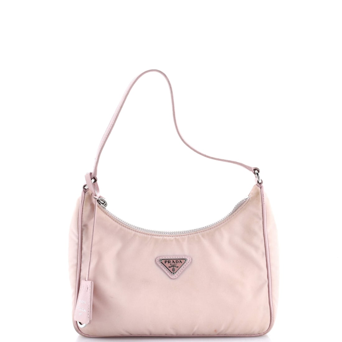 Prada Re-Edition 2000 Hobo Tessuto Mini: Presented here, the Prada Re-Edition 2000 Hobo arrives with the proportions and stance that the house refined into a recognizable signature. Construction sits in tessuto, Prada's signature technical n