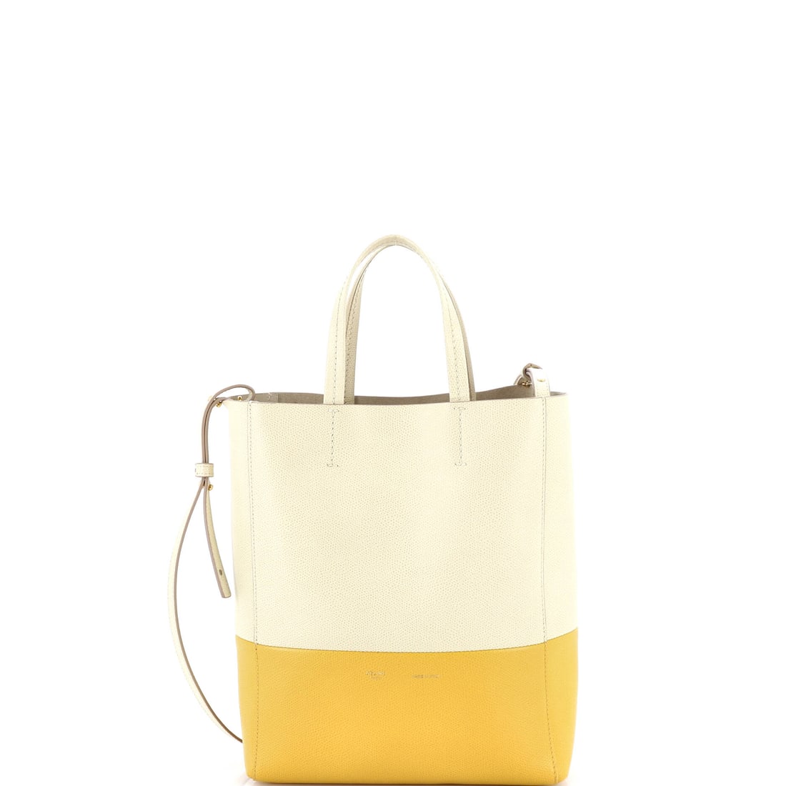 Celine Vertical Bi-Cabas Tote Grained Calfskin Small: Celine's Vertical Bi-Cabas Tote reads first as architecture and only second as accessory, which is the highest compliment for a house bag. It is constructed in Grained Calfskin, with the kind of