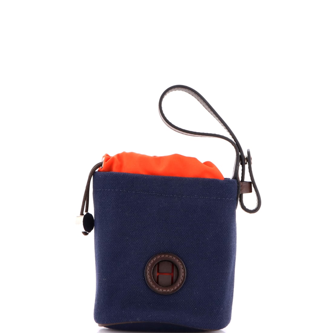 Hermes On-The-Go Dog Pouch Toile: Hermes's On-The-Go Dog Pouch arrives as a soft-hand pouch from the house's leather-goods library, polished enough to read as deliberate at any scale. Built in Toile, the silhouette reads as deliberate