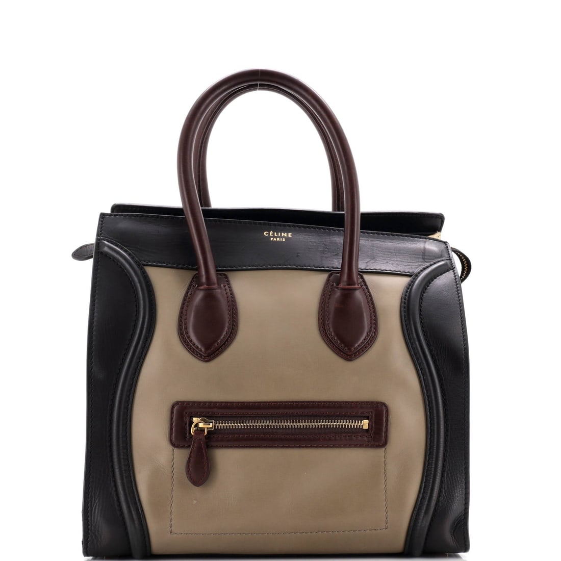 Celine Bicolor Luggage Bag Leather Mini: Celine's Bicolor Luggage Bag sits squarely in the maison's most-quoted handbag language, with a profile that has earned its place in serious wardrobes. The make is in Leather, a choice that gives the 