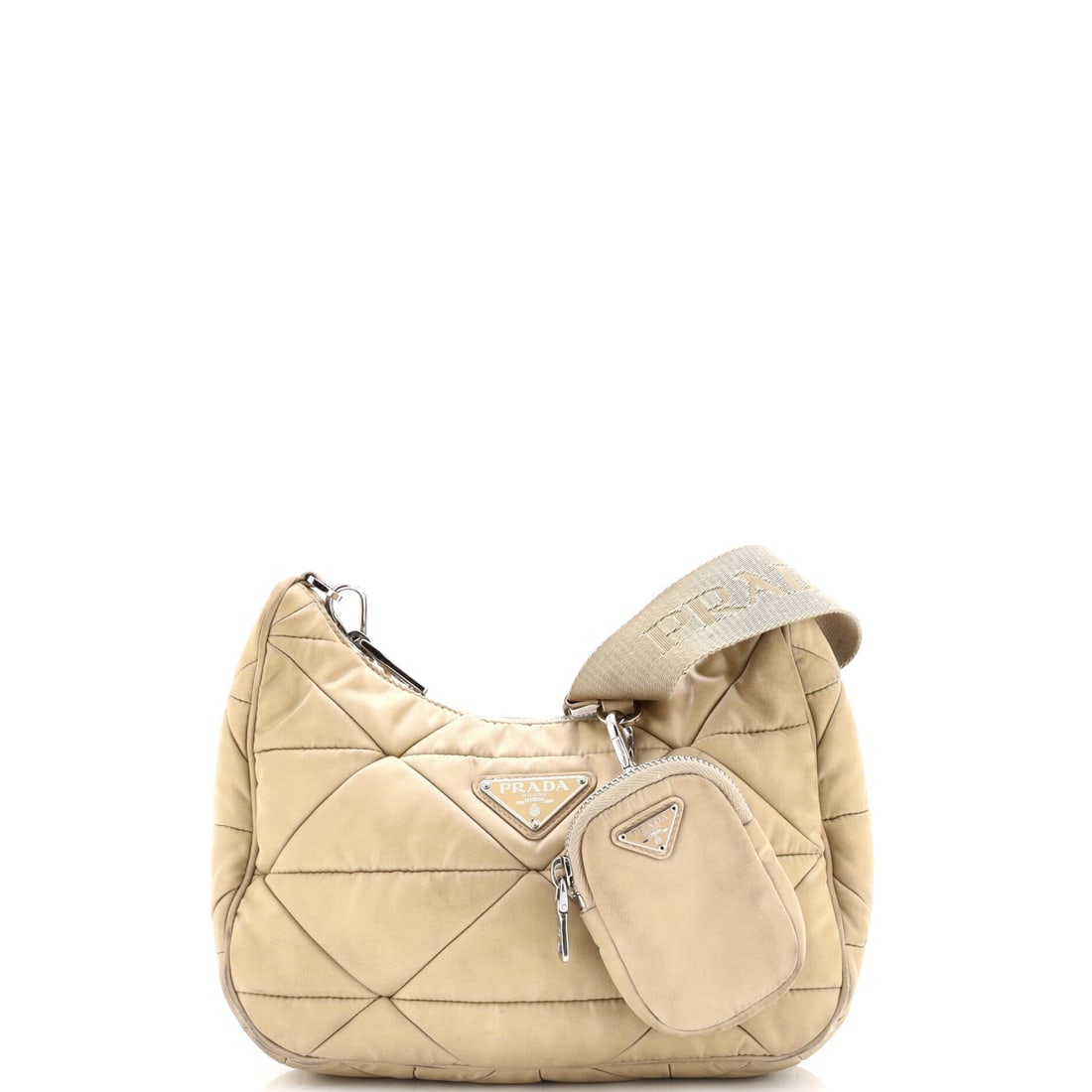 Prada Re-Edition Shoulder Bag Quilted Tessuto Small: The Re-Edition Shoulder Bag from Prada reads as a thoughtful piece of bag-making, with construction that prioritizes posture and proportion over noise. The leatherwork is in tessuto, Prada's signature