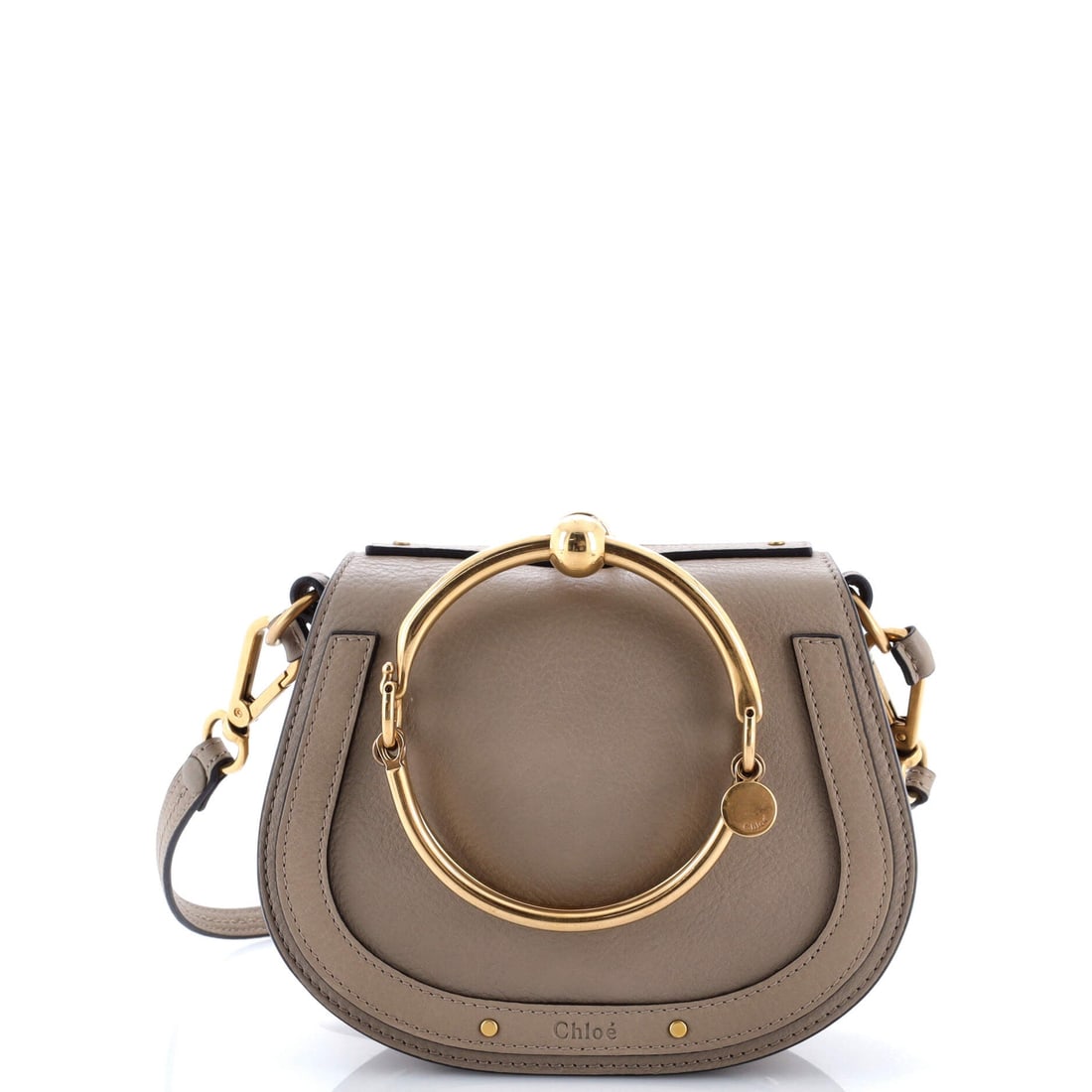 Chloe Nile Crossbody Bag Leather Small: The Chloe Nile Crossbody Bag carries a stance the maison has refined across many iterations into something instantly recognizable. It is constructed in Leather, with the kind of considered finish the 