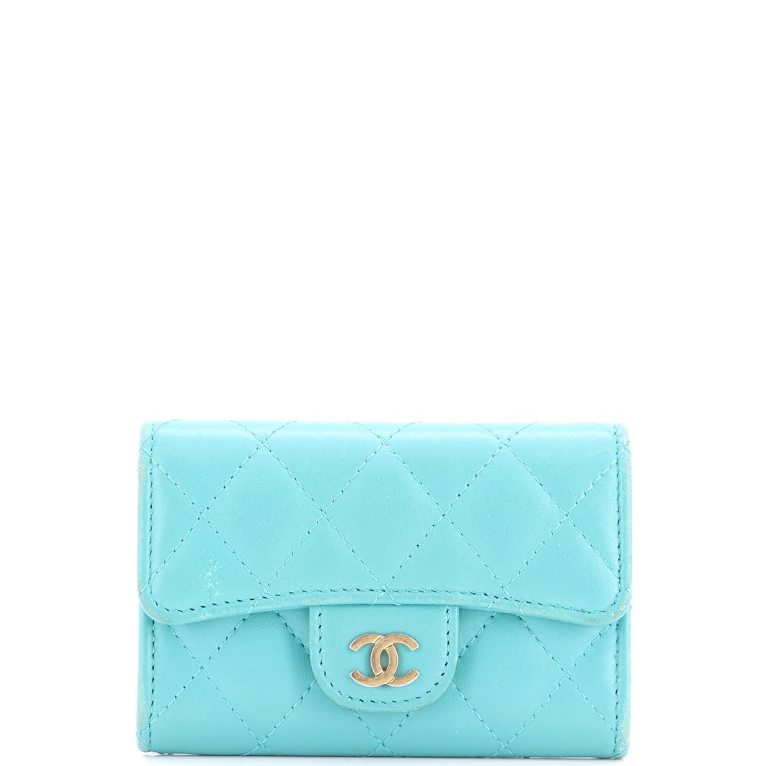 Chanel Classic Flap Card Case Quilted Lambskin: The Classic Flap Card Case is one of Chanel's most-carried small-goods silhouettes, the size and shape that earned a place in many wardrobes. Surface and finish come from lambskin, the softer and more