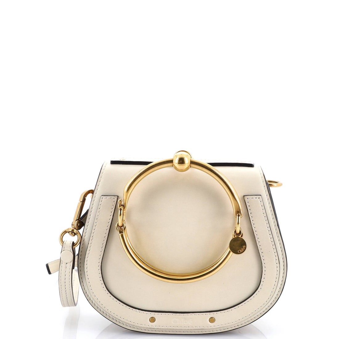 Chloe Nile Crossbody Bag Leather Small: Chloe's Nile Crossbody Bag sits squarely in the maison's most-quoted handbag language, with a profile that has earned its place in serious wardrobes. The build sits in Leather, finished to the standar