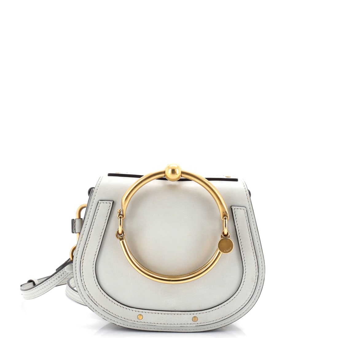 Chloe Nile Crossbody Bag Leather Small: The Nile Crossbody Bag is one of Chloe's most translatable silhouettes, a piece that adjusts to its wearer rather than the other way around. It is constructed in Leather, with the kind of considered f