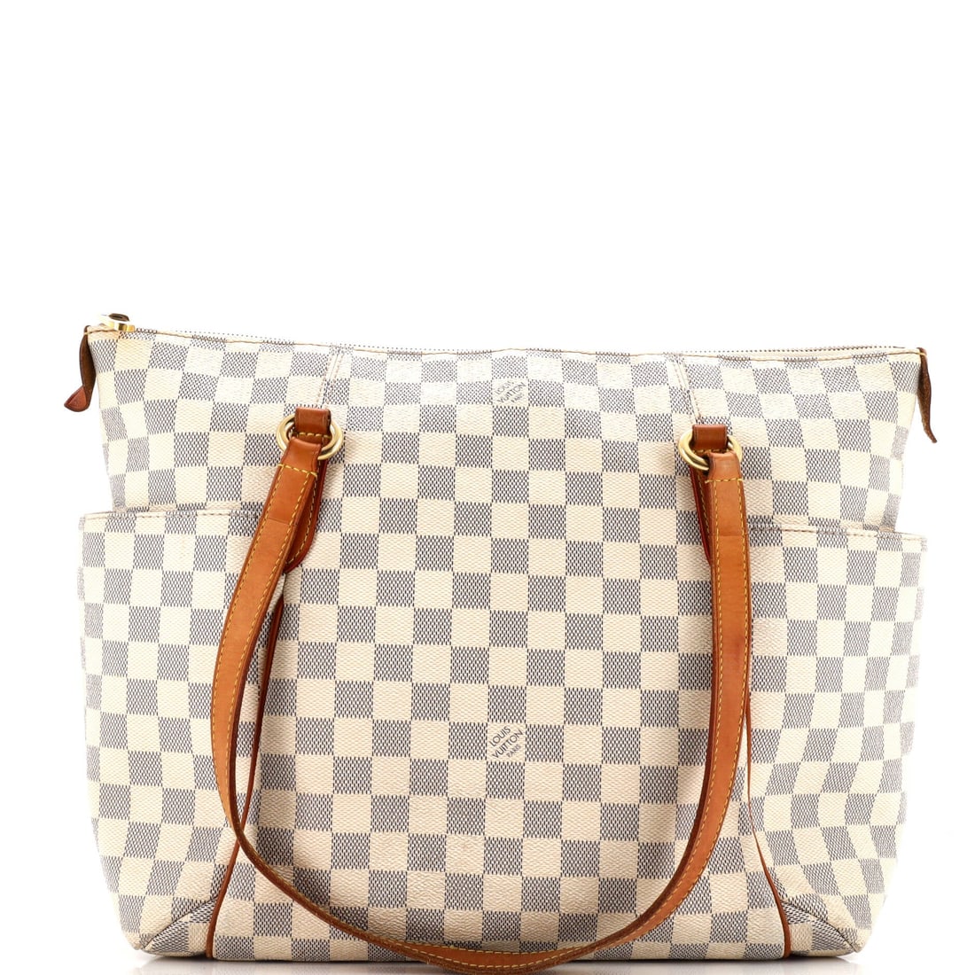 Louis Vuitton Totally Handbag Damier MM: Louis Vuitton's Totally Handbag sits squarely in the maison's most-quoted handbag language, with a profile that has earned its place in serious wardrobes. Construction sits in the Damier coated canvas