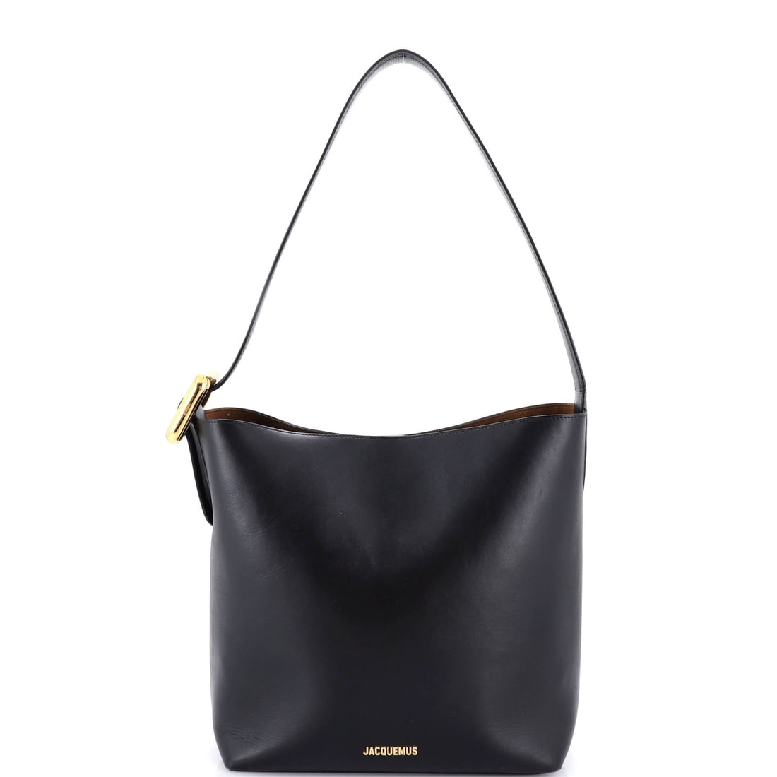 Jacquemus Le Regalo Bucket Bag Leather: This Jacquemus Le Regalo Bucket Bag arrives through Maison de Beaubigonne's trade channel with the silhouette the house treats as a fixture in its core lineup. The build sits in Leather, finished to t