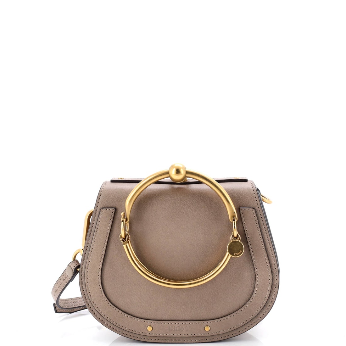 Chloe Nile Crossbody Bag Leather Small: From the Chloe archive, the Nile Crossbody Bag carries the kind of architecture that translates clearly across daytime, travel, and evening rotation. Worked in Leather, the surface carries a measured,