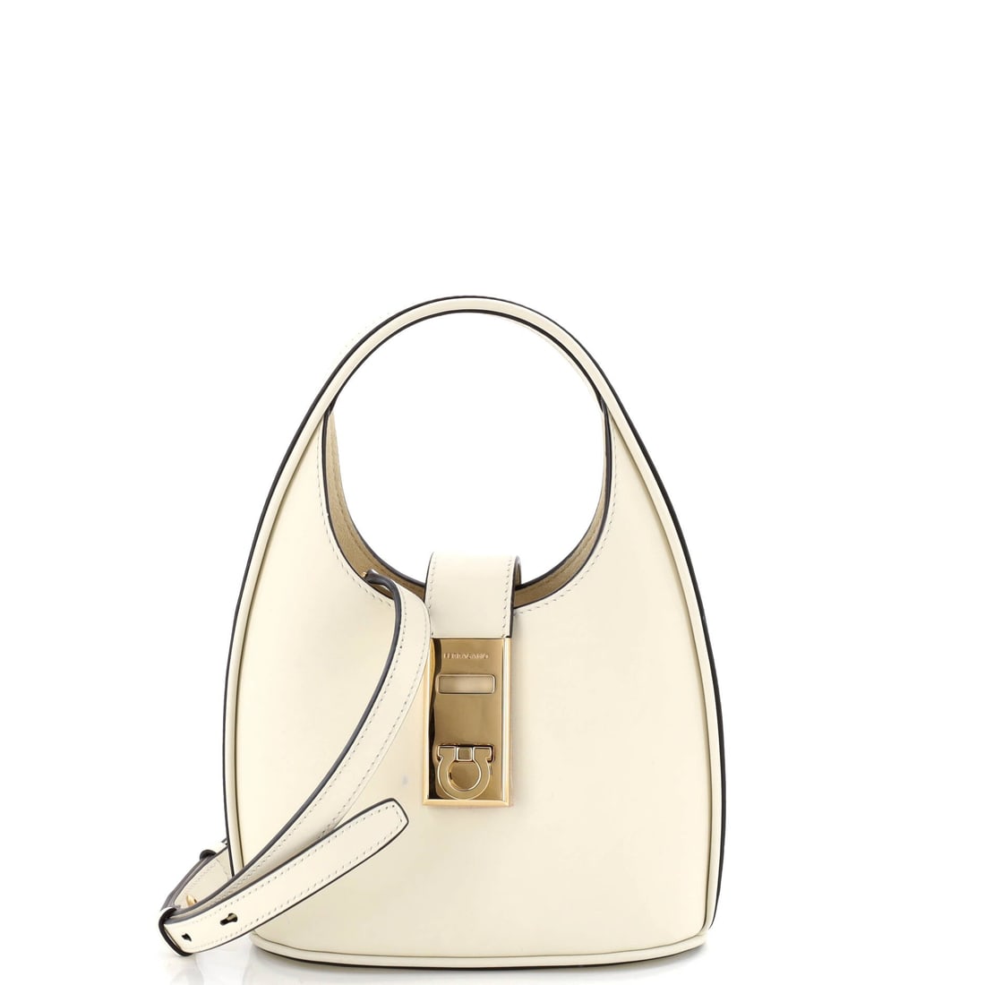 Salvatore Ferragamo Gancini Buckle Hobo Leather Mini: The Gancini Buckle Hobo from Salvatore Ferragamo reads as a thoughtful piece of bag-making, with construction that prioritizes posture and proportion over noise. It is constructed in Leather, with the