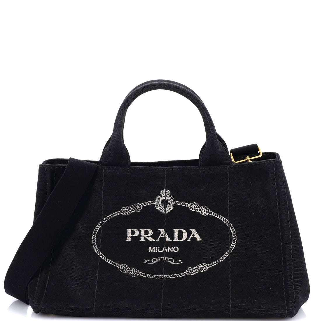 Prada Canapa Convertible Tote Canvas Medium: Prada built the Canapa Convertible Tote as a piece that holds its own in a wardrobe rather than competing with it. It is constructed in Canvas, with the kind of considered finish the house is known fo