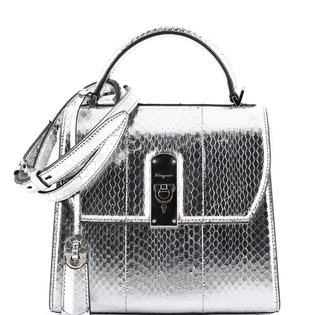 Salvatore Ferragamo Boxyz Top Handle Bag Snakeskin Medium: From Salvatore Ferragamo, this Boxyz Top Handle Bag arrives in a configuration the house designed to read as both deliberate and easy. The make is in Snakeskin, a choice that gives the piece its quiet