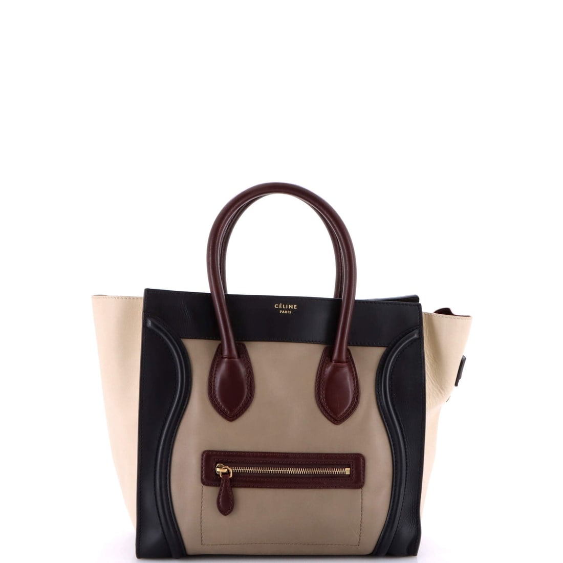 Celine Bicolor Luggage Bag Leather Mini: Celine's Bicolor Luggage Bag is a study in measured architecture, the kind of carry that telegraphs taste before it ever signals brand. Cut in Leather, it has the considered hand a careful collector r