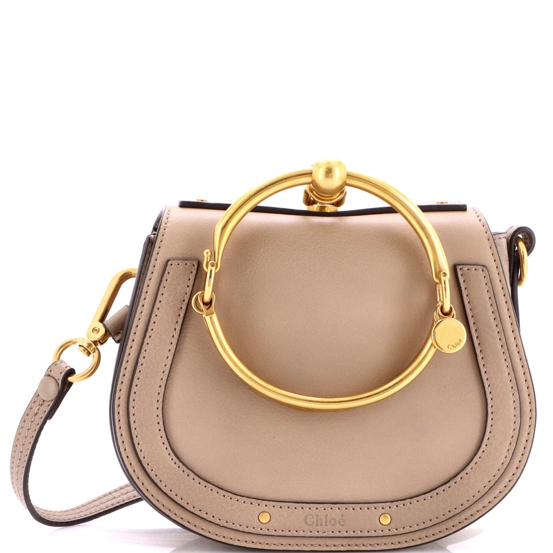 Chloe Nile Crossbody Bag Leather Small: Presented here, the Chloe Nile Crossbody Bag arrives with the proportions and stance that the house refined into a recognizable signature. Built in Leather, the silhouette reads as deliberate rather t
