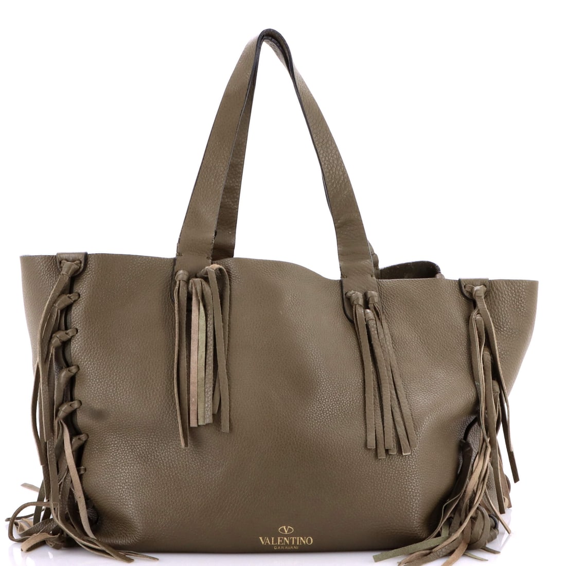 Valentino Garavani C-Rockee Fringe Tote Leather Medium: The C-Rockee Fringe Tote sits in Valentino Garavani's most quietly confident silhouette family, where line and weight do the talking. The build sits in Leather, finished to the standard that defines t