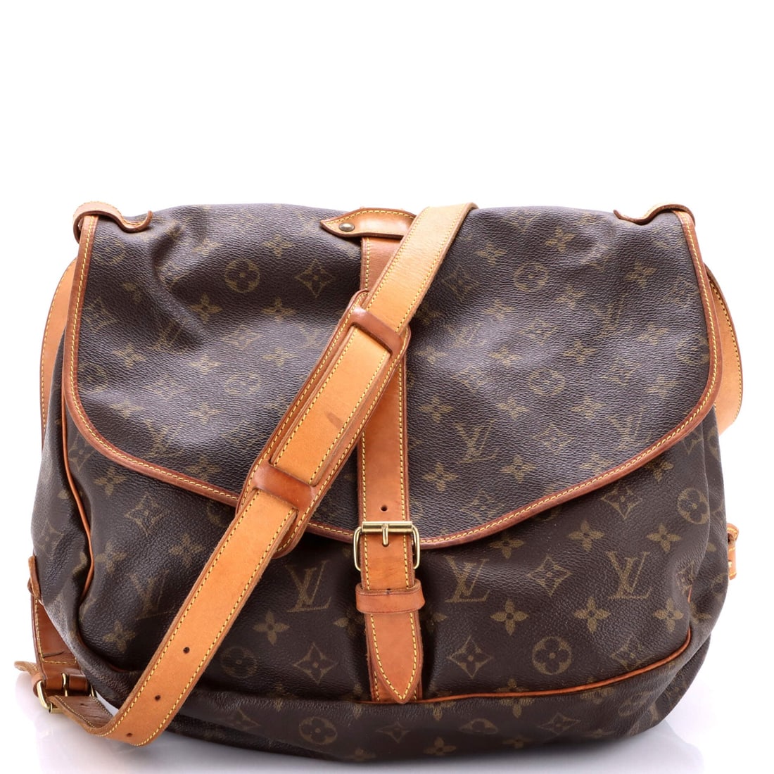 Louis Vuitton Saumur Handbag Monogram Canvas 35: The Saumur Handbag is one of Louis Vuitton's most translatable silhouettes, a piece that adjusts to its wearer rather than the other way around. The build is in Monogram coated canvas, the house's