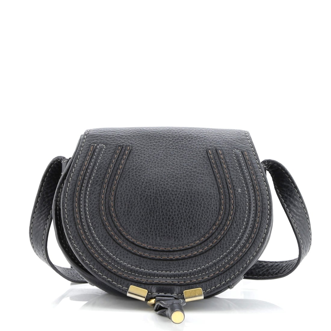 Chloe Marcie Crossbody Bag Leather Small: Chloe's Marcie Crossbody Bag reads first as architecture and only second as accessory, which is the highest compliment for a house bag. It is constructed in Leather, with the kind of considered finish