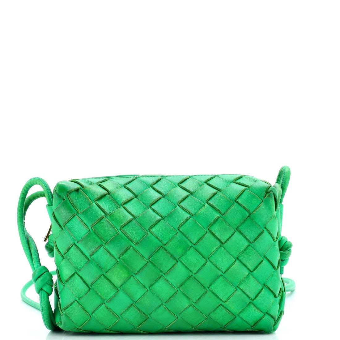 Bottega Veneta Loop Crossbody Bag Intrecciato Nappa Mini: The Bottega Veneta Loop Crossbody Bag carries a stance the maison has refined across many iterations into something instantly recognizable. The build is in intrecciato, Bottega Veneta's hand-woven lea