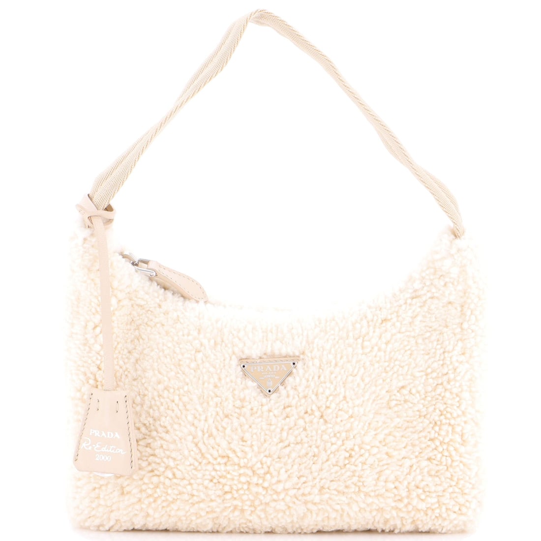 Prada Re-Edition 2000 Hobo Shearling Mini: This Prada Re-Edition 2000 Hobo arrives through Maison de Beaubigonne's trade channel with the silhouette the house treats as a fixture in its core lineup. Construction sits in shearling, the plush sh
