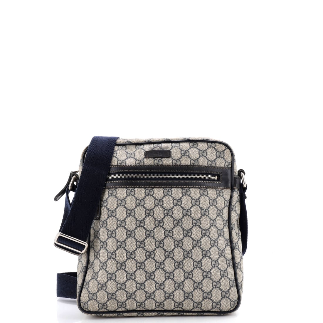 Gucci Front Zip Messenger GG Coated Canvas Medium: Gucci's Front Zip Messenger reads first as architecture and only second as accessory, which is the highest compliment for a house bag. Worked in GG Coated Canvas, the surface carries a measured, well-